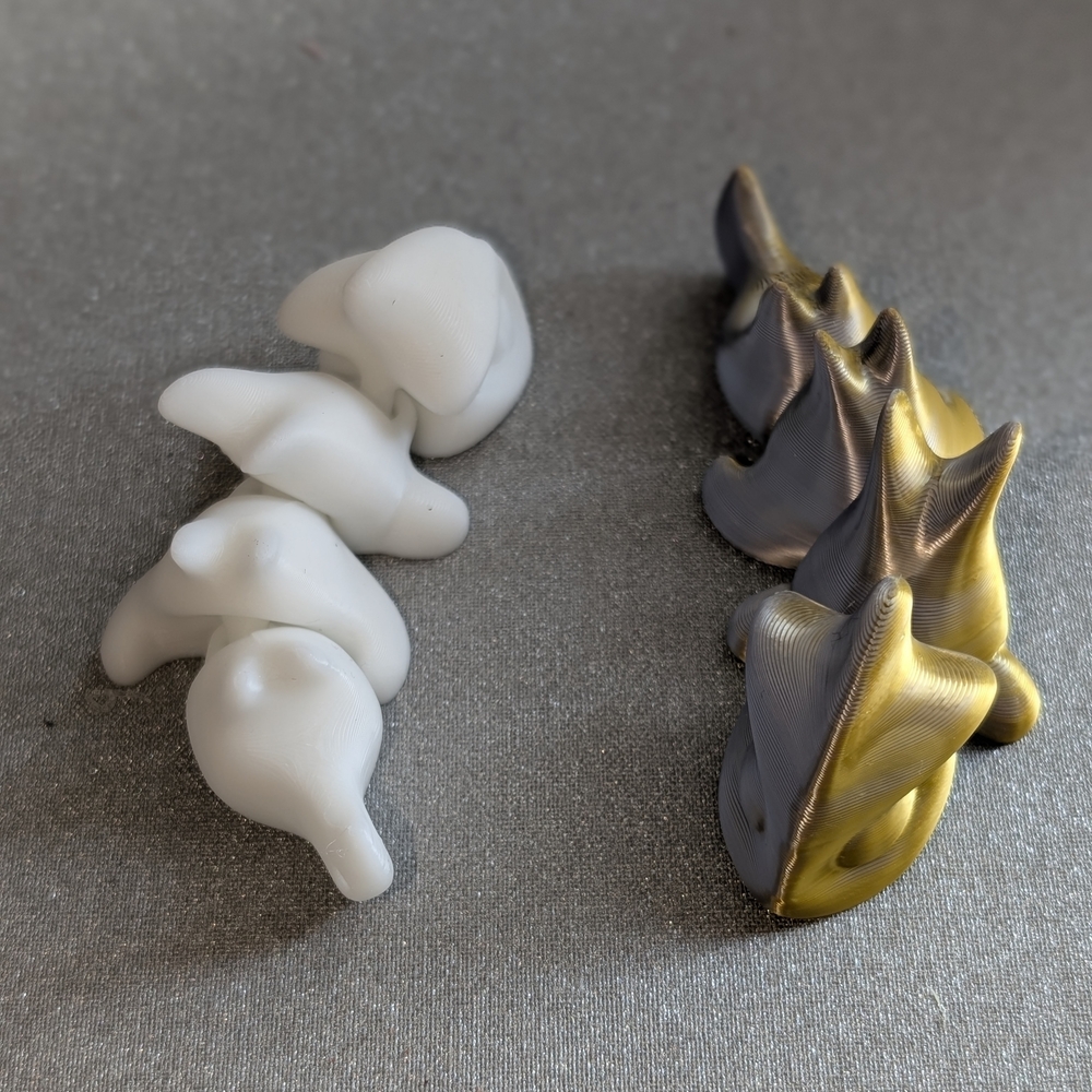 White and Gold-Gray Sculptural Pieces